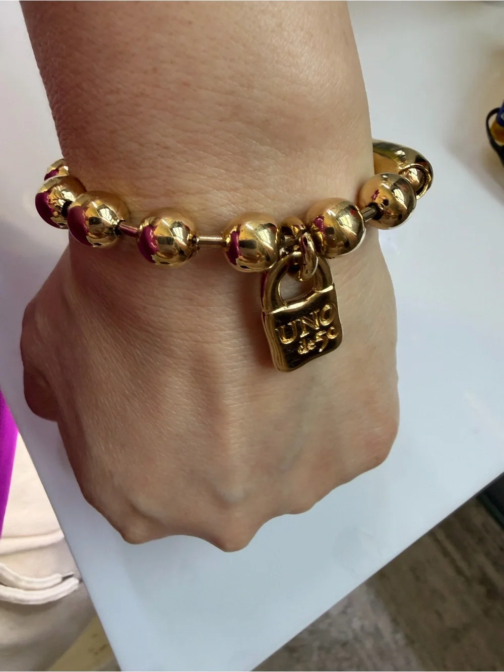 UNO de 50 Gold-Tone Beaded Bracelet with Padlock Charm
